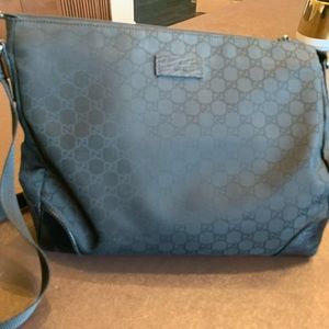 Gucci messenger bag.